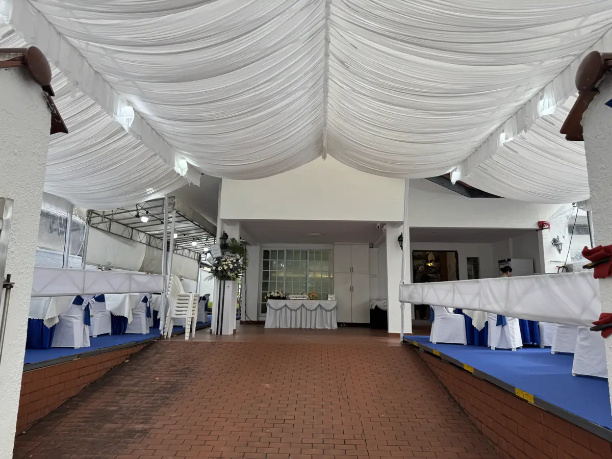 An air-conditioned funeral parlour hall in Singapore set up for a Wake