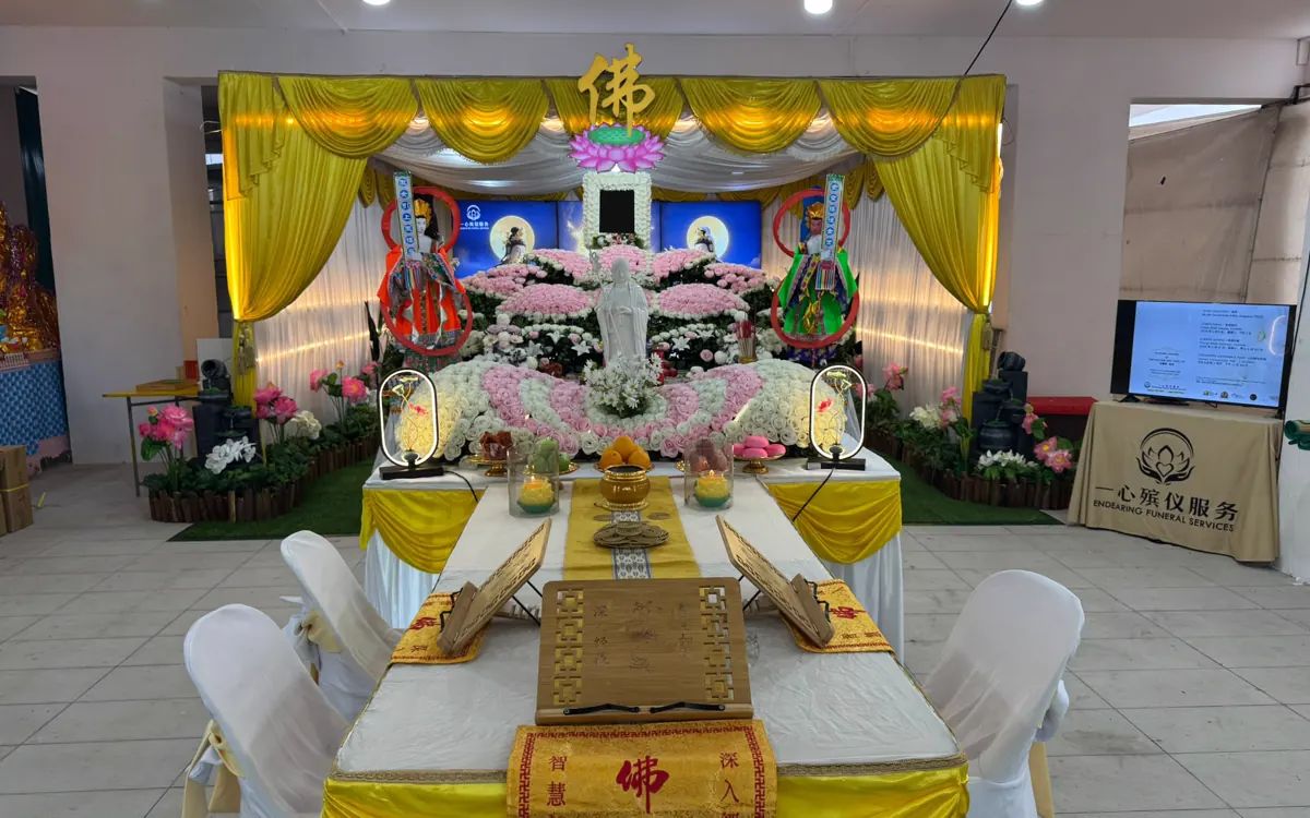 A traditional Chinese funeral band with gongs and drums at a wake