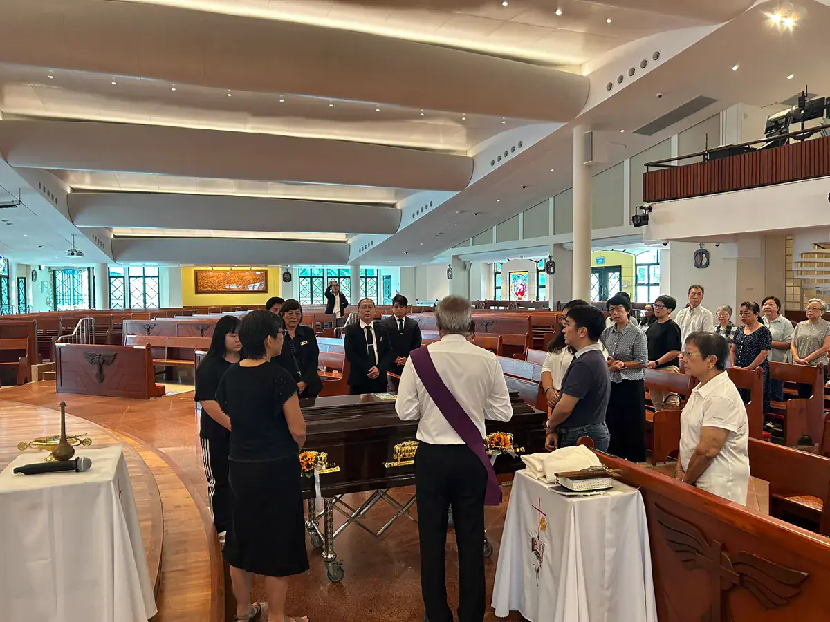 Guests paying their respects at a wake in Singapore