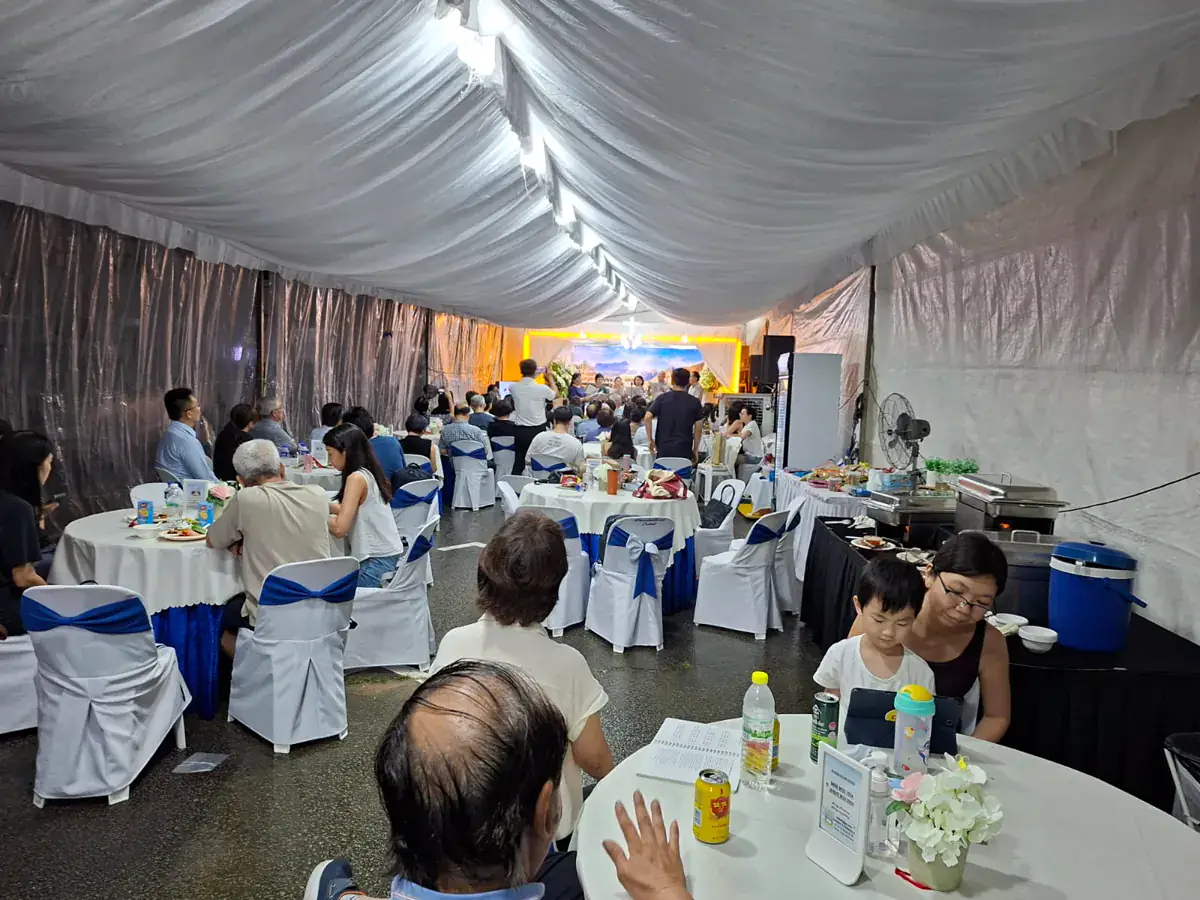 Guests seated at a wake, with the hall and refreshments looked after by my team