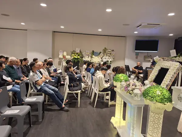 Guests seated at a Roman Catholic wake
