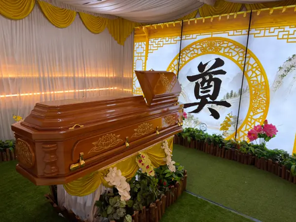 Taoist funeral setup with floral arrangements in Singapore