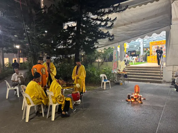 Taoist wake hall with cross and drapery in Singapore