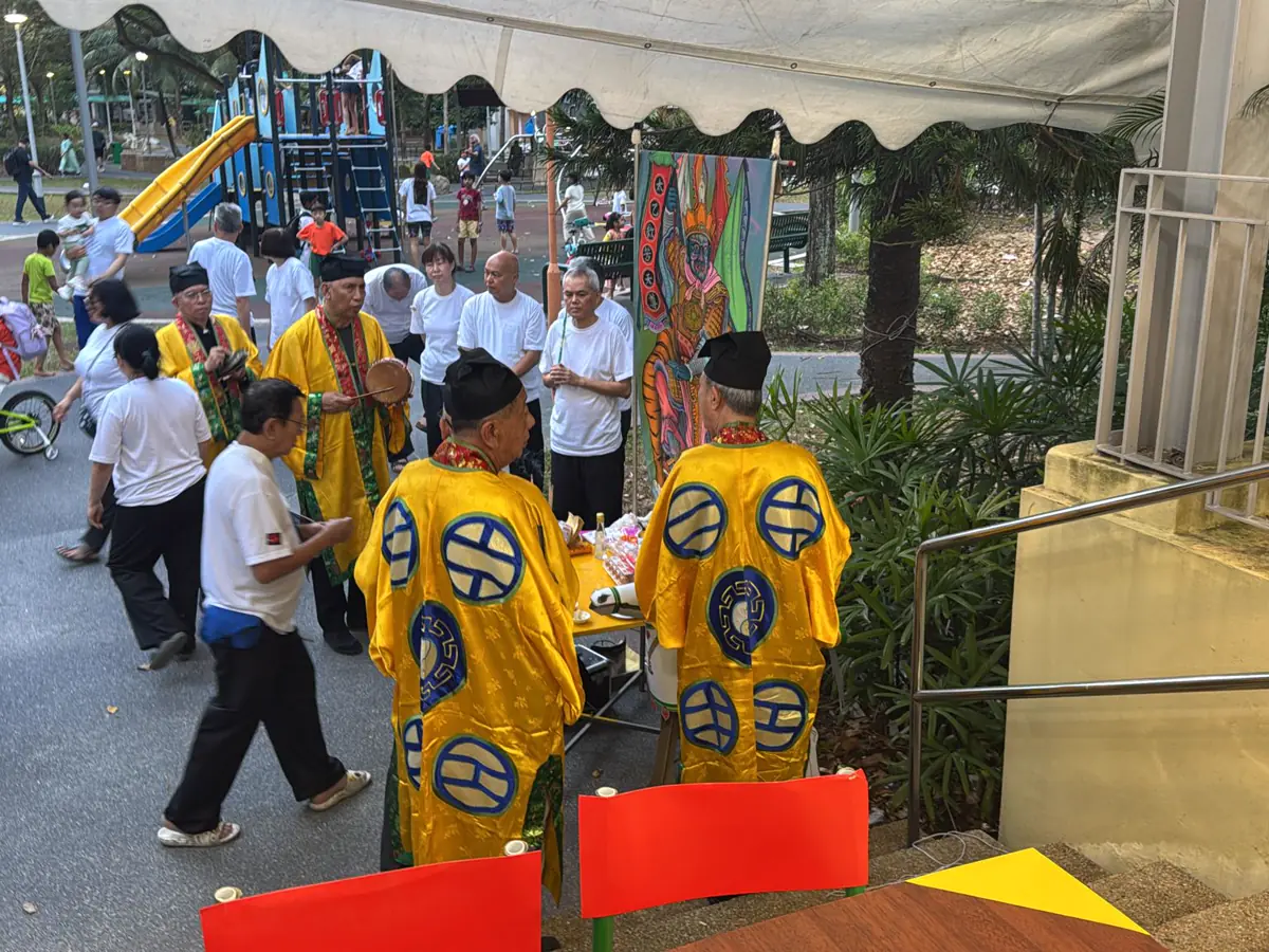The funeral procession setting off from a Taoist wake in Singapore